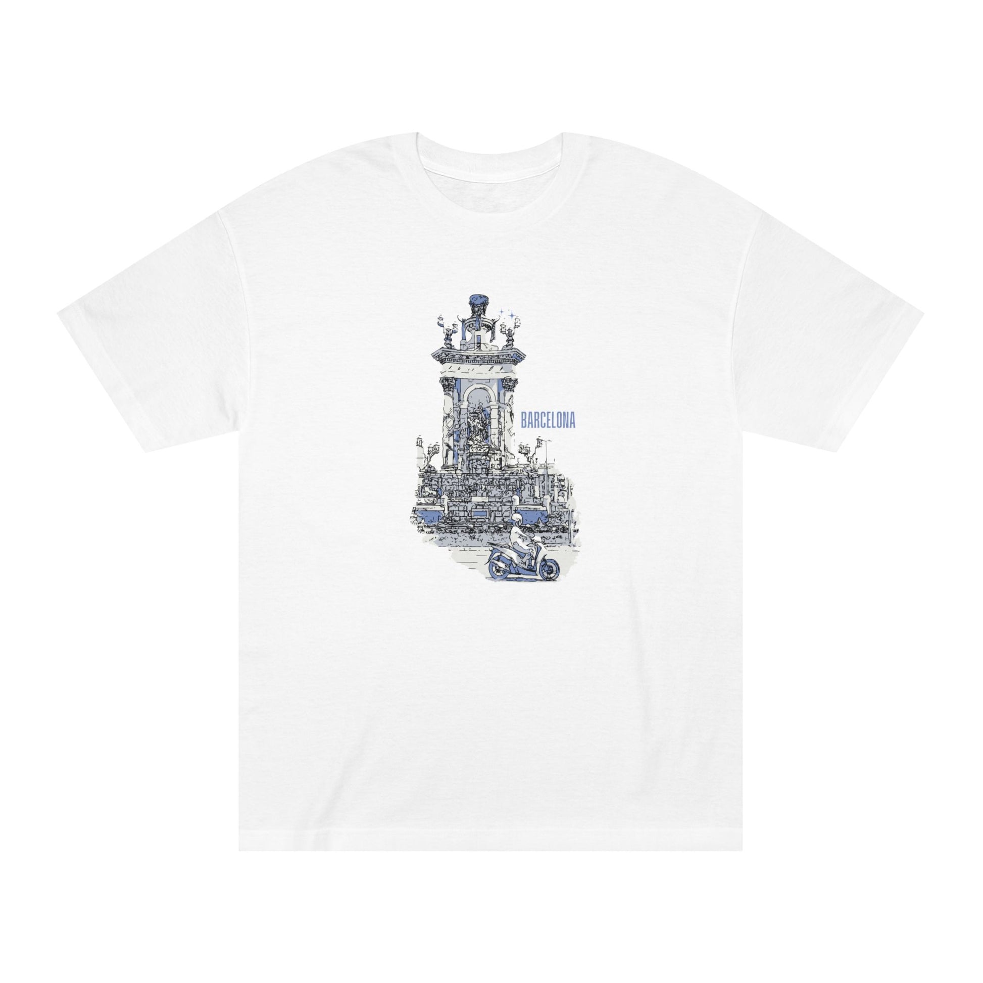 A white short-sleeve crewneck t-shirt featuring a detailed blue and gray graphic print of the Barcelona Cathedral bell tower and a small motorcycle in the foreground.