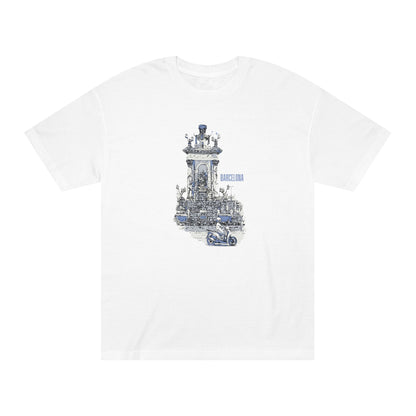 A white short-sleeve crewneck t-shirt featuring a detailed blue and gray graphic print of the Barcelona Cathedral bell tower and a small motorcycle in the foreground.